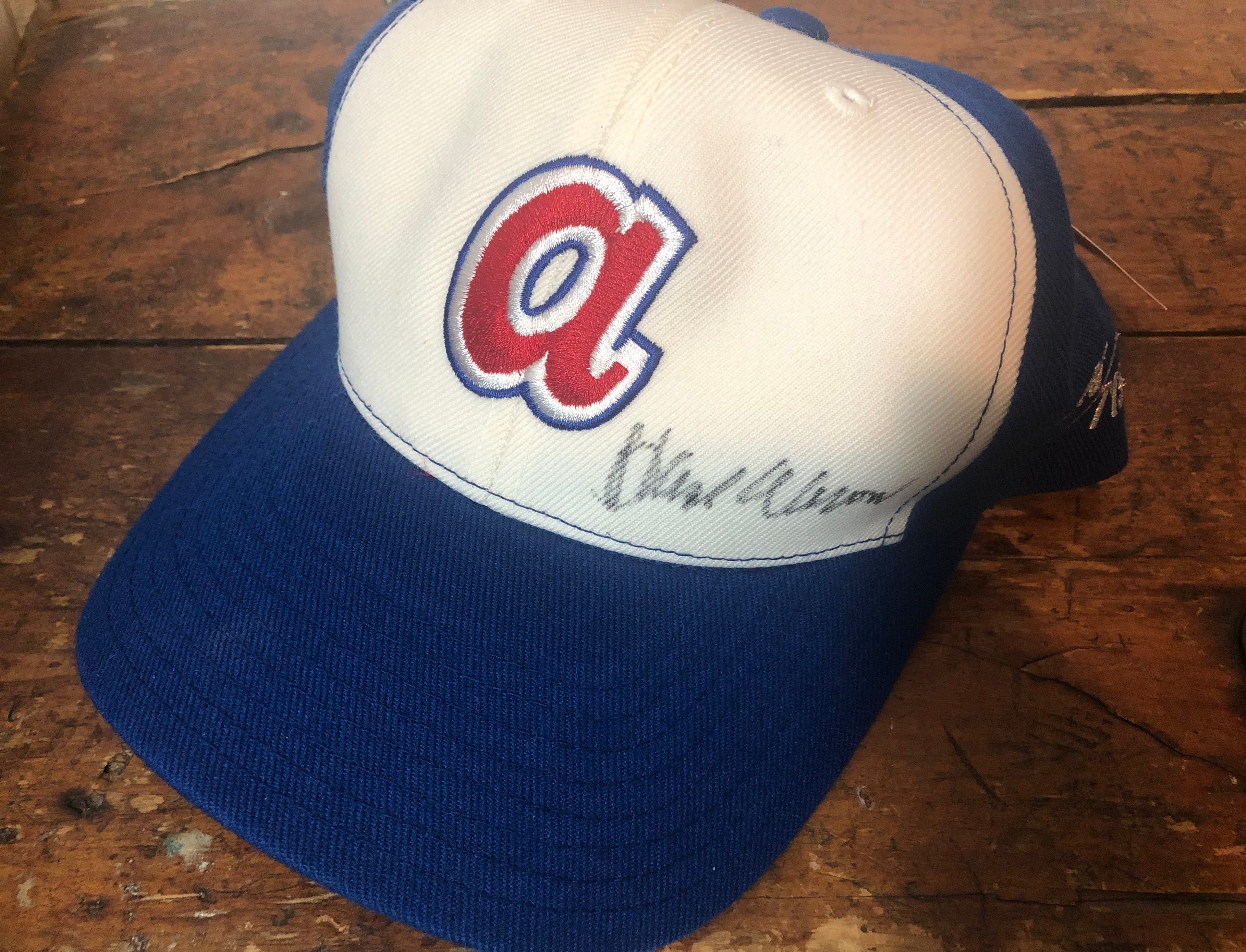 Vintage Atlanta Braves hat signed by Hank Aaron
